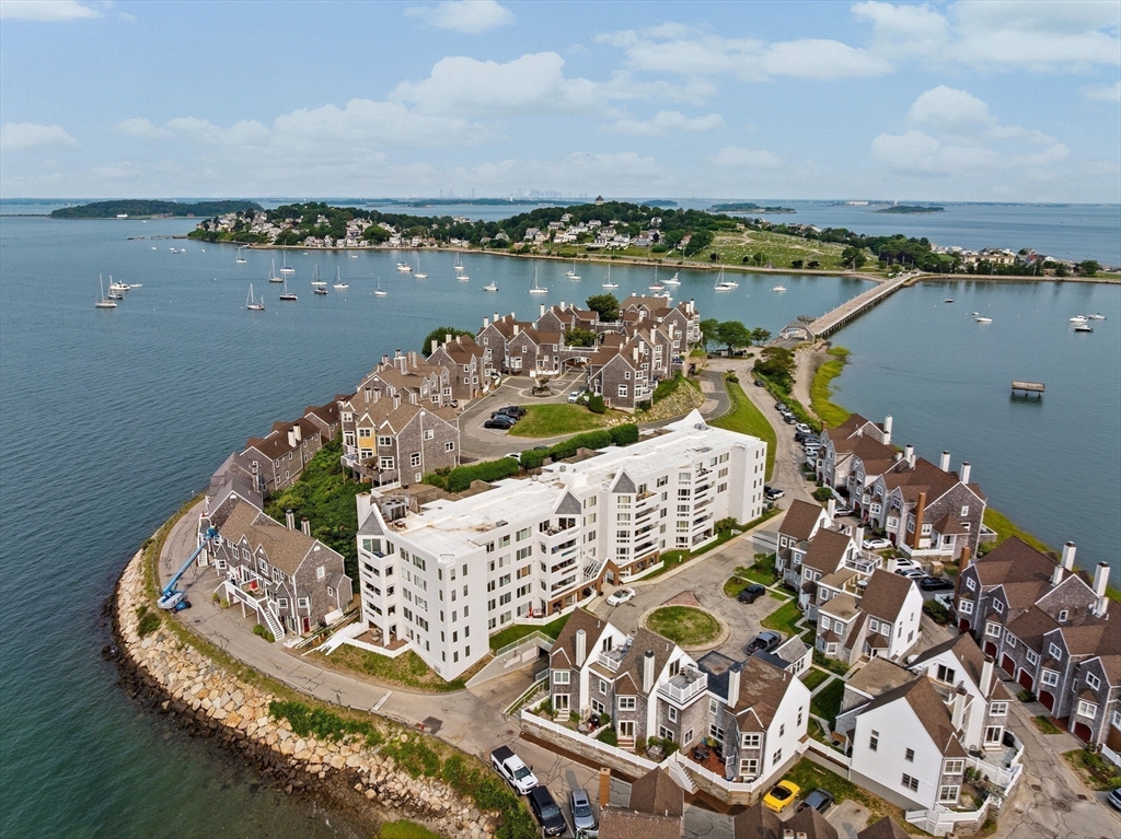 1 Commodore Court, Unit 305 Hull, MA 02045 - Photo 26 of 27 an aerial view of a house with a lake view