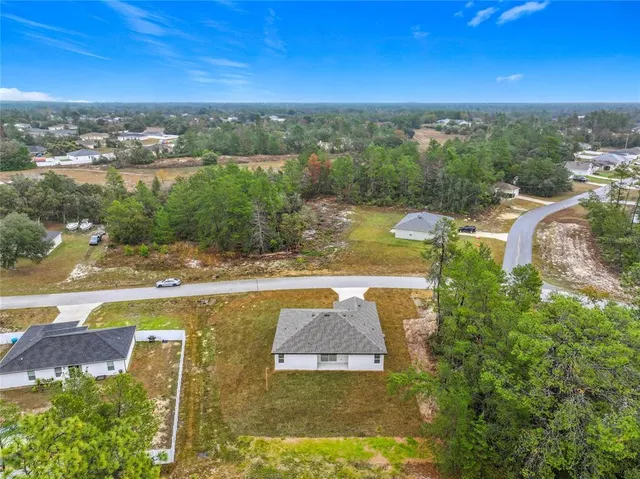 a view of a house with a swimming pool