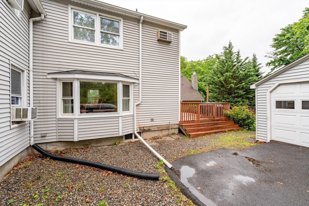 267 Maple Street East Longmeadow, MA 01028 - Photo 22 of 25 a view of a house with a yard and garage
