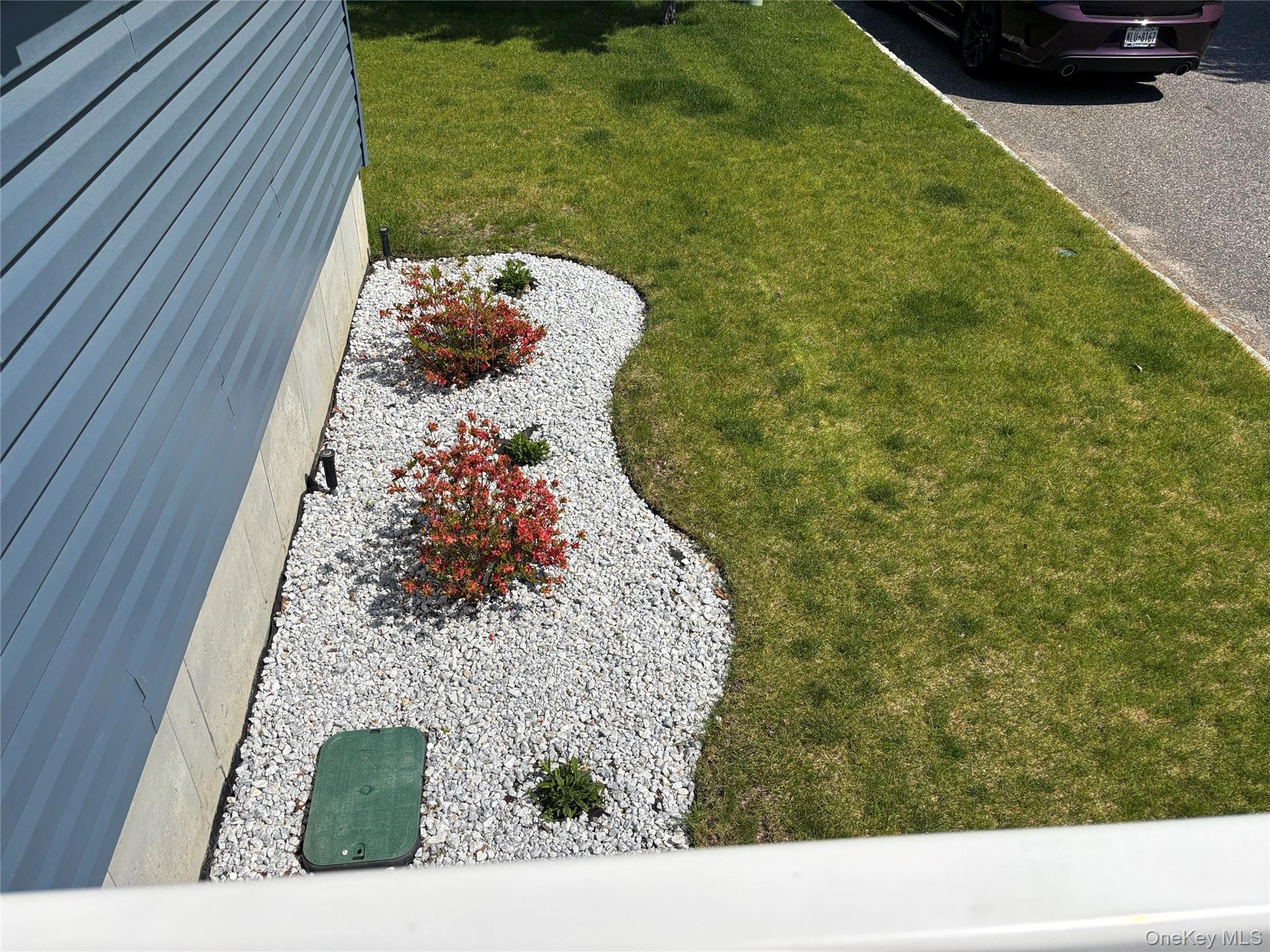 1661 Old Country Road, Unit 563 Riverhead, NY 11901 - Photo 8 of 43 a bird view of a garden