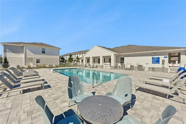 a view of park with large trees