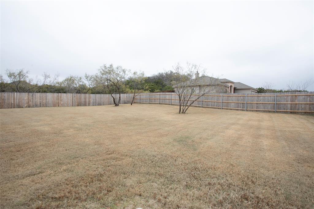1185 Green Elm Road Graford, TX 76449 - Photo 25 of 25 back yard