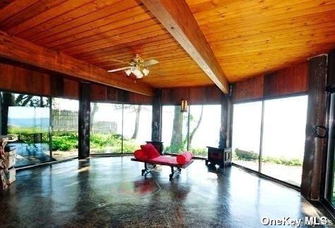 48 Westland Drive Glen Cove, NY 11542 - Photo 12 of 25 a living room filled with furniture