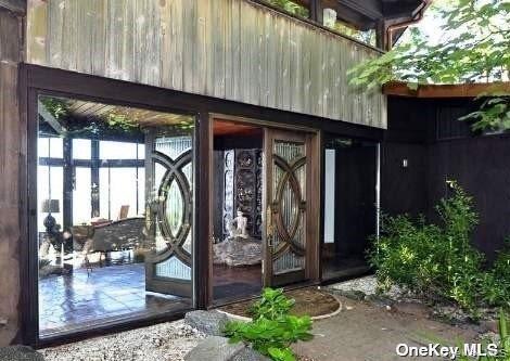 48 Westland Drive Glen Cove, NY 11542 - Photo 19 of 25 a view of a porch