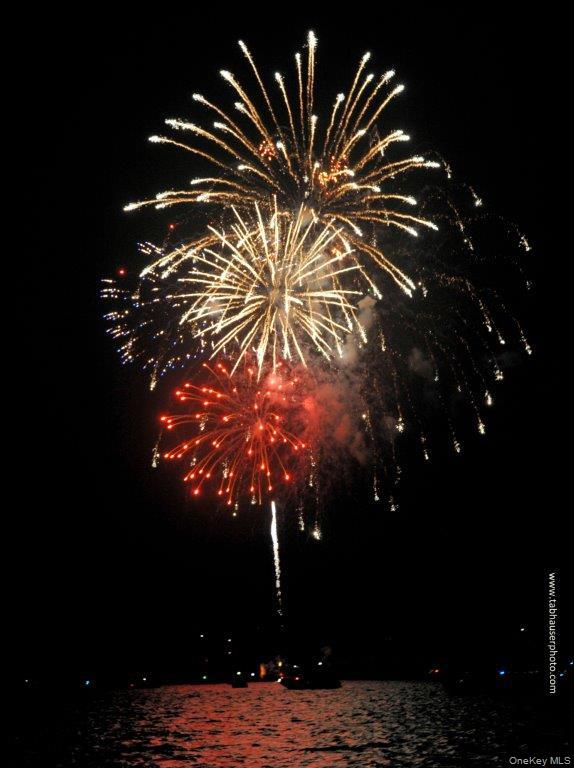 48 Westland Drive Glen Cove, NY 11542 - Photo 22 of 25 a view of a house with a tree