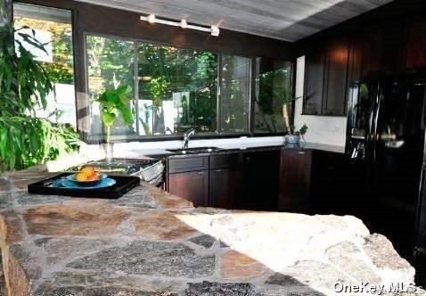 48 Westland Drive Glen Cove, NY 11542 - Photo 10 of 25 a kitchen with a sink and large window