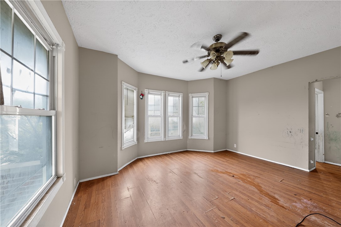 205 Rita Street Dayton, OH 45404 - Photo 9 of 34 This spacious living area features elegant hardwood flooring and ample natural light from multiple windows.