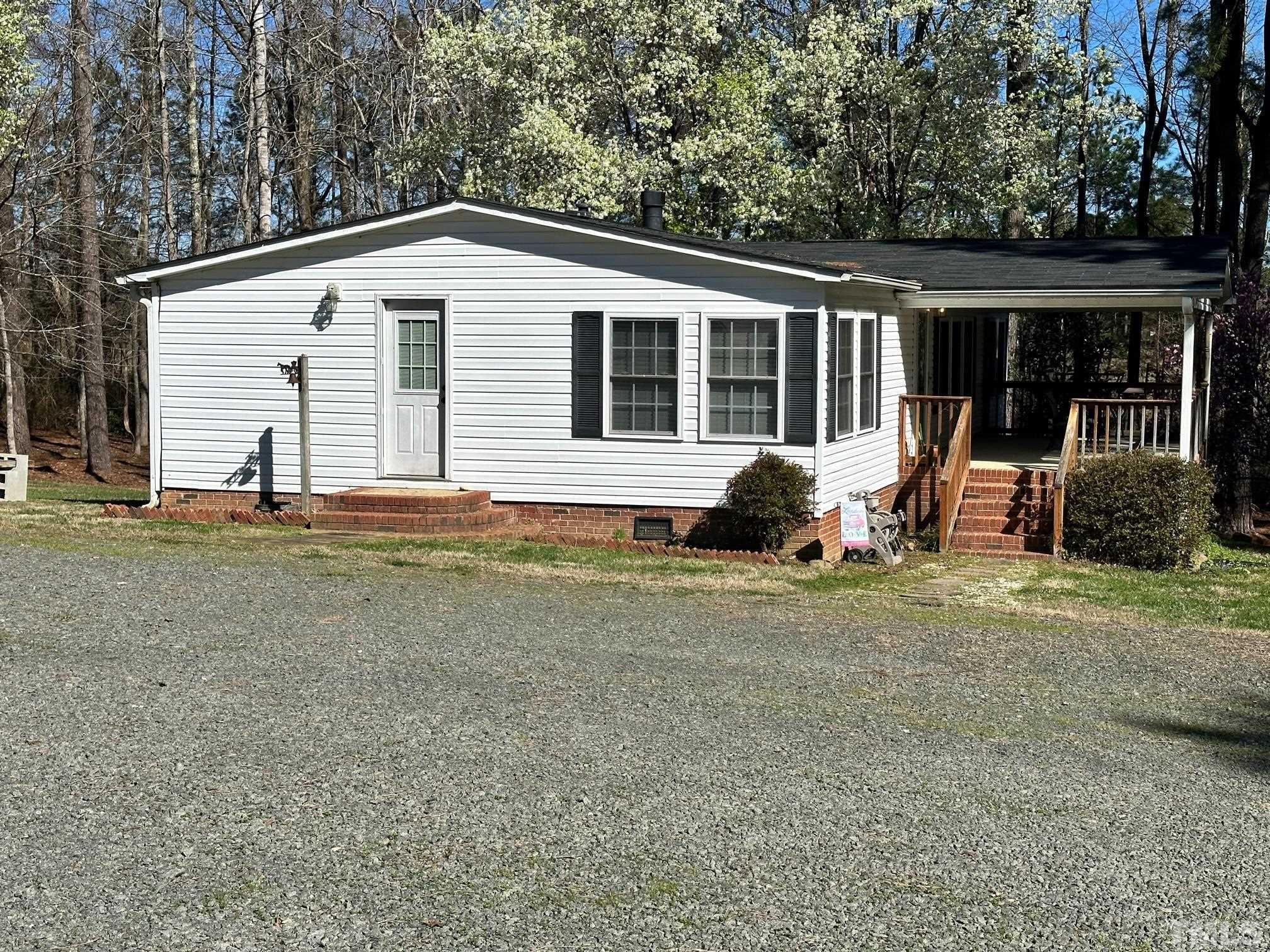 4505 Culbreth Road Stem, NC 27581 - Photo 3 of 3 a backyard of a house