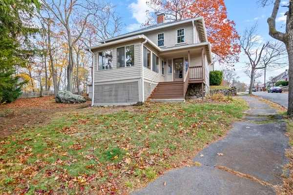 front view of a house with a yard