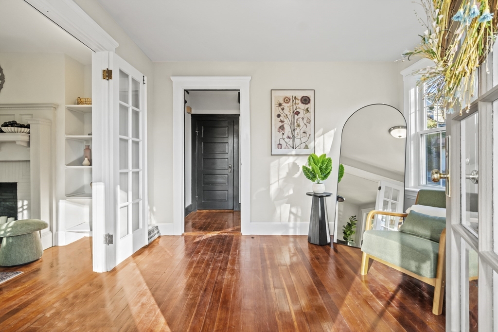 2 Overlook Road Wakefield, MA 01880 - Photo 14 of 42 a bedroom with a bed table and a potted plant