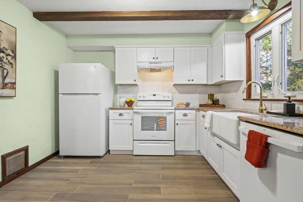 2 Overlook Road Wakefield, MA 01880 - Photo 16 of 42 a kitchen with a white cabinets and white appliances