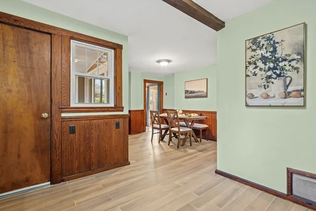 a view of a livingroom with furniture and window