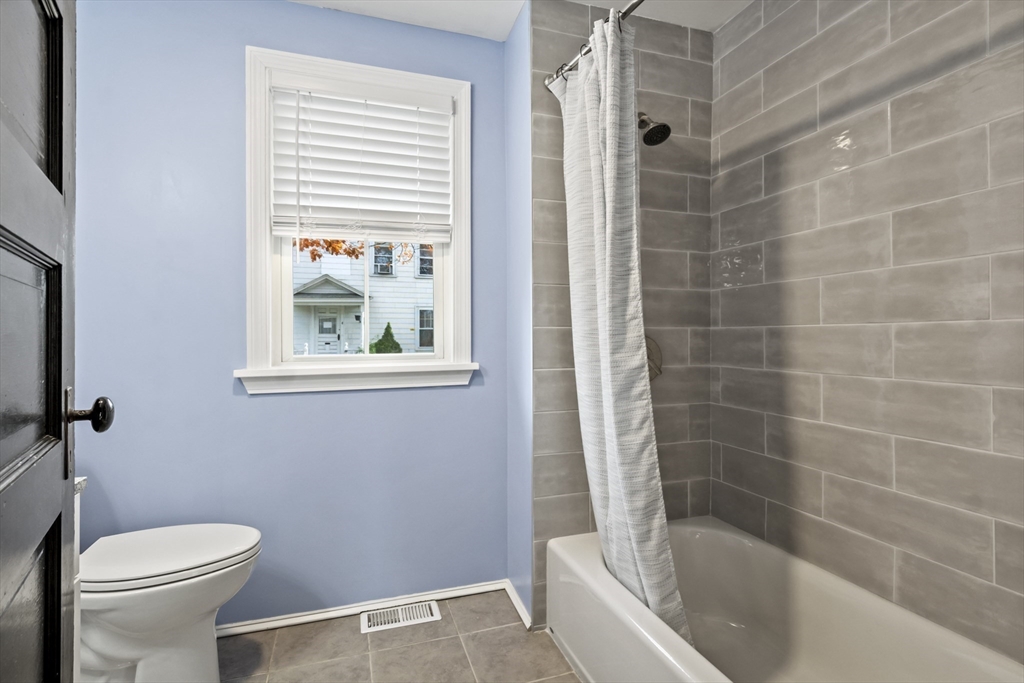 2 Overlook Road Wakefield, MA 01880 - Photo 22 of 42 a bath room with a toilet and a bath tub
