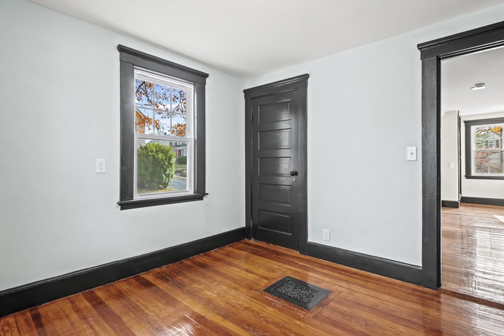 2 Overlook Road Wakefield, MA 01880 - Photo 26 of 42 wooden floor in an empty room with a window