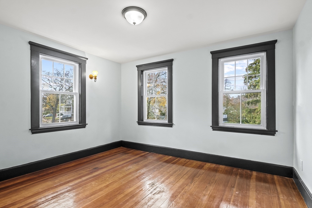 2 Overlook Road Wakefield, MA 01880 - Photo 42 of 42 a view of an empty room with wooden floor and a window