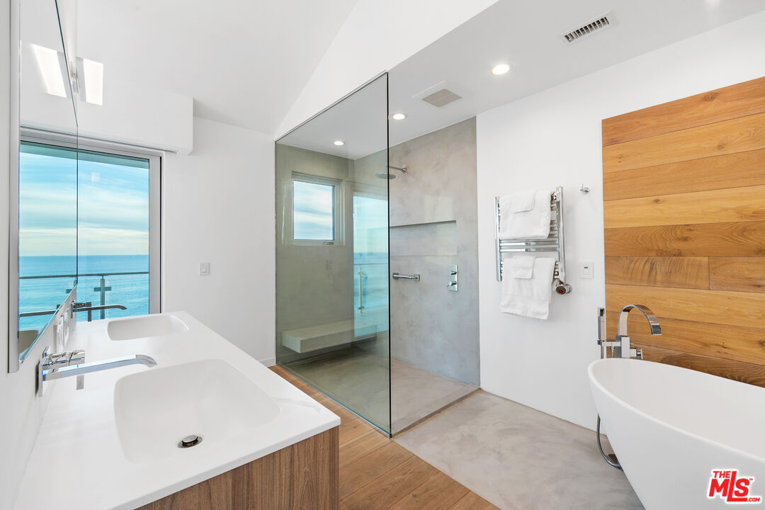 31666 Broad Beach Road Malibu, CA 90265 - Photo 11 of 23 a bathroom with a bathtub and a sink