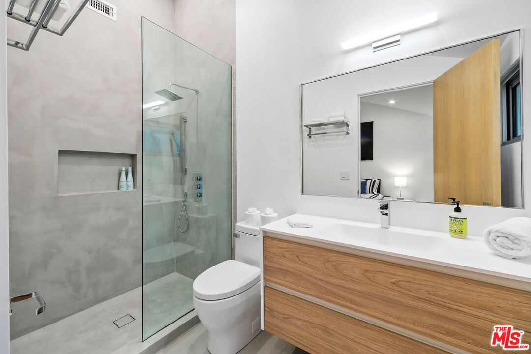 31666 Broad Beach Road Malibu, CA 90265 - Photo 15 of 23 a bathroom with a sink a toilet and shower