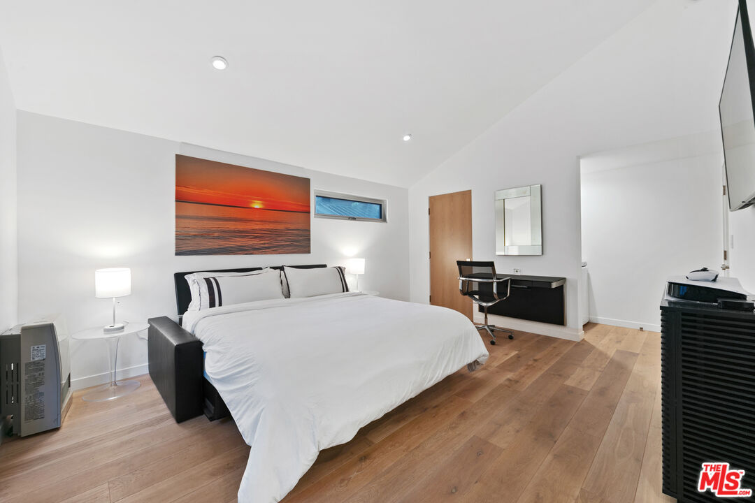 31666 Broad Beach Road Malibu, CA 90265 - Photo 18 of 23 a bed room with a bed and a tv