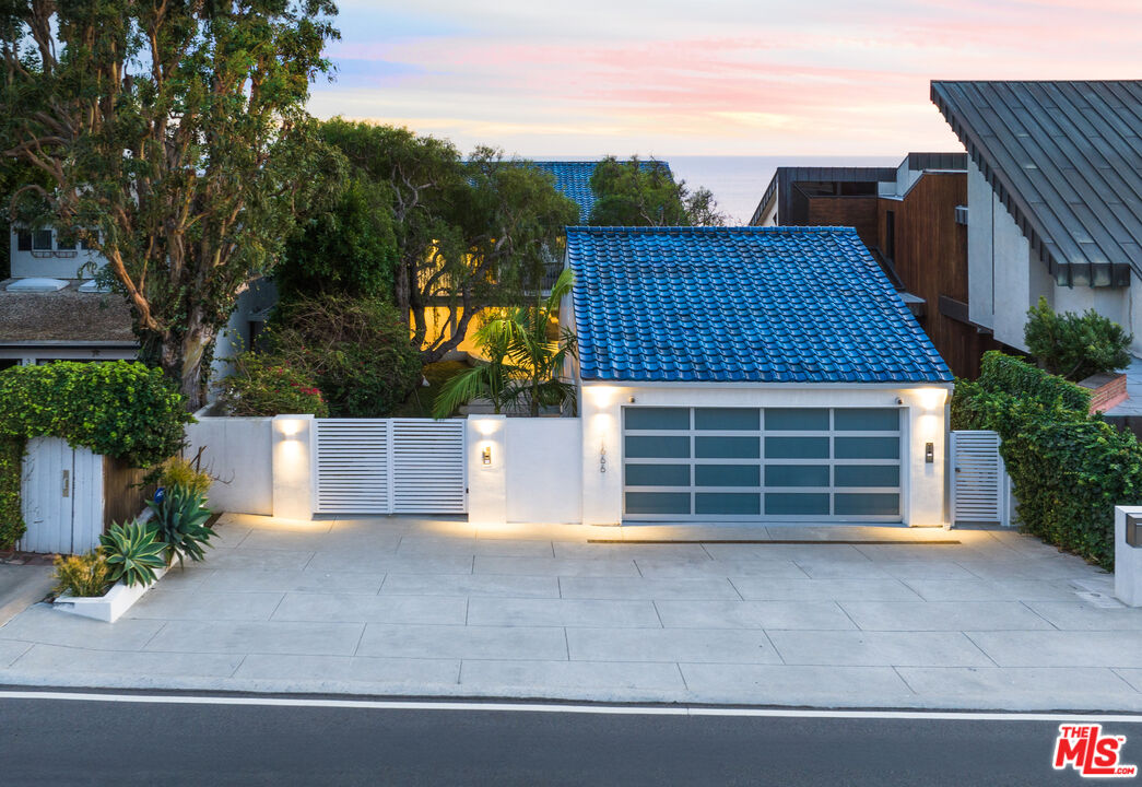 31666 Broad Beach Road Malibu, CA 90265 - Photo 22 of 23 front view of a house with a garage