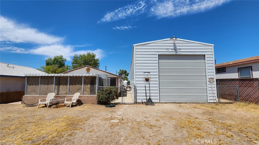 5120 Colorado River Road Blythe, CA 92225 - Photo 16 of 57 Front view of primary house and RV garage, facing west toward the street