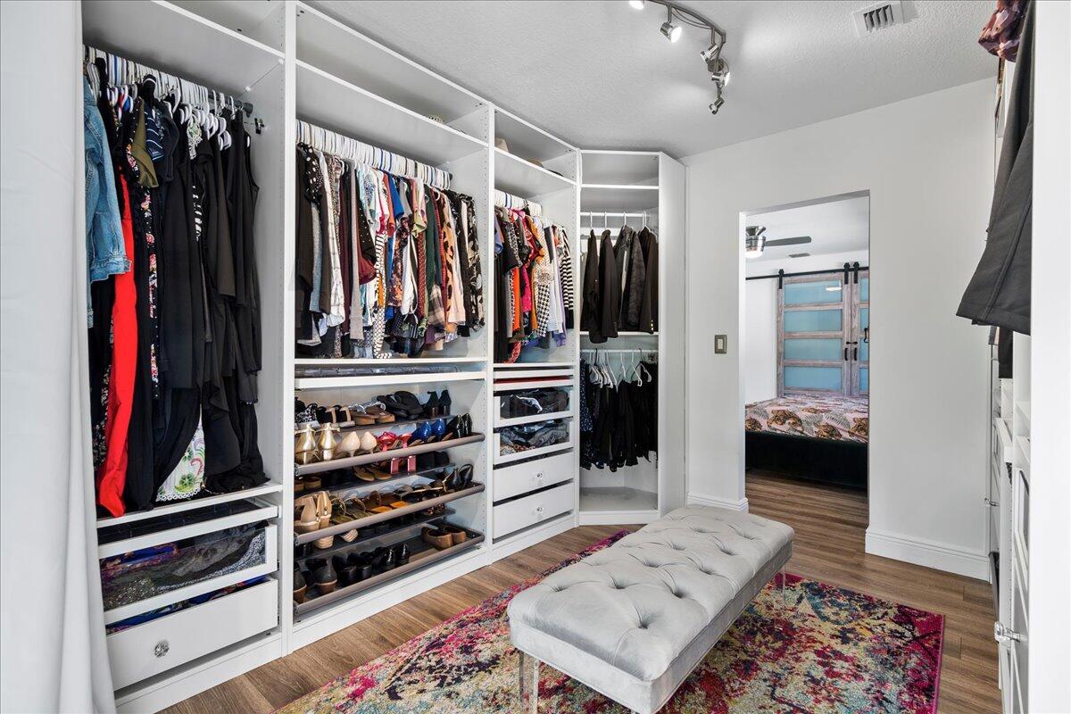 1969 Southwest 36th Avenue Delray Beach, FL 33445 - Photo 14 of 40 Primary Walk In Closet