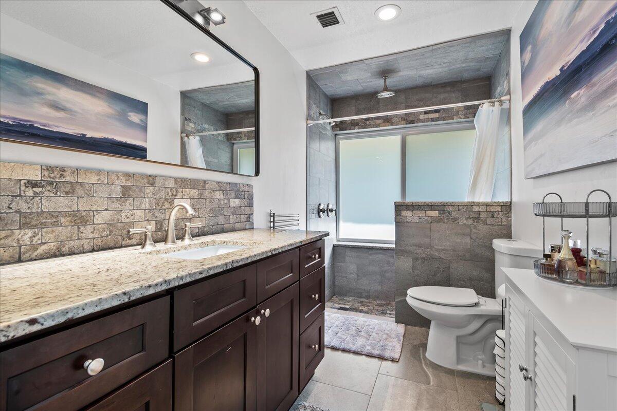 1969 Southwest 36th Avenue Delray Beach, FL 33445 - Photo 16 of 40 Primary Bathroom