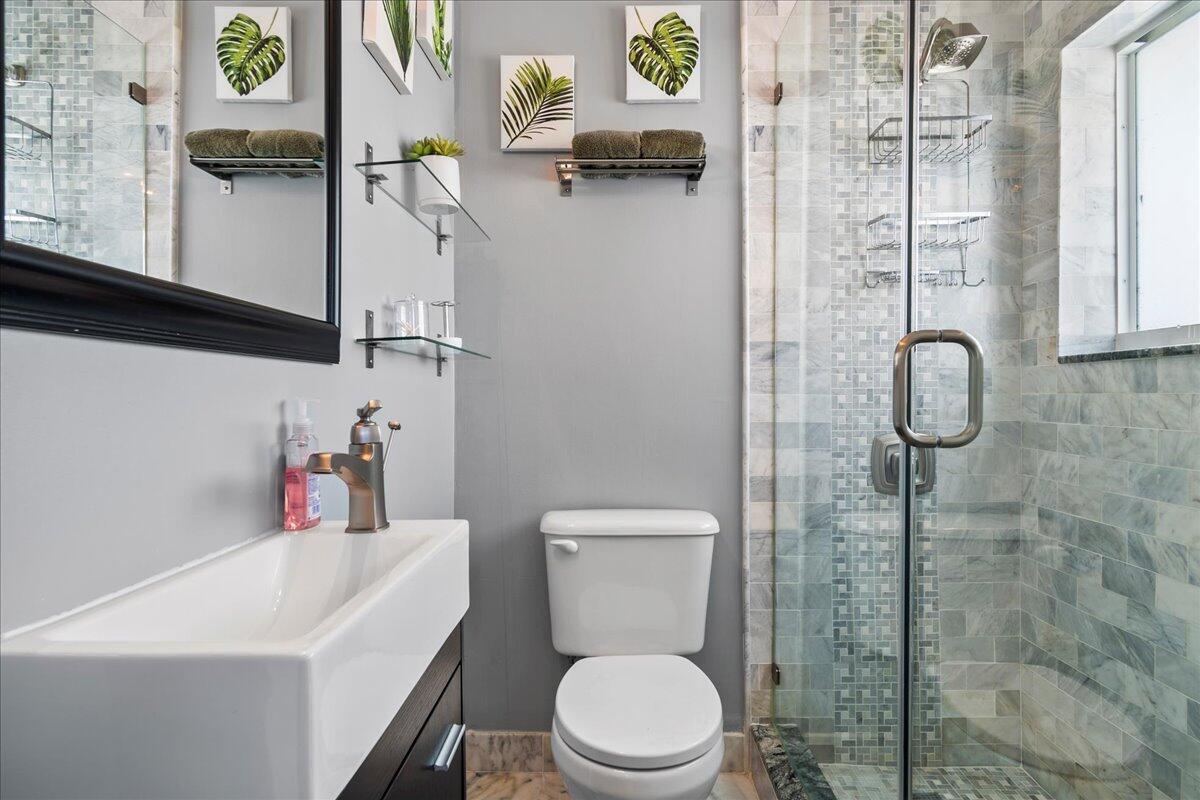 1969 Southwest 36th Avenue Delray Beach, FL 33445 - Photo 21 of 40 Bathroom to Suite