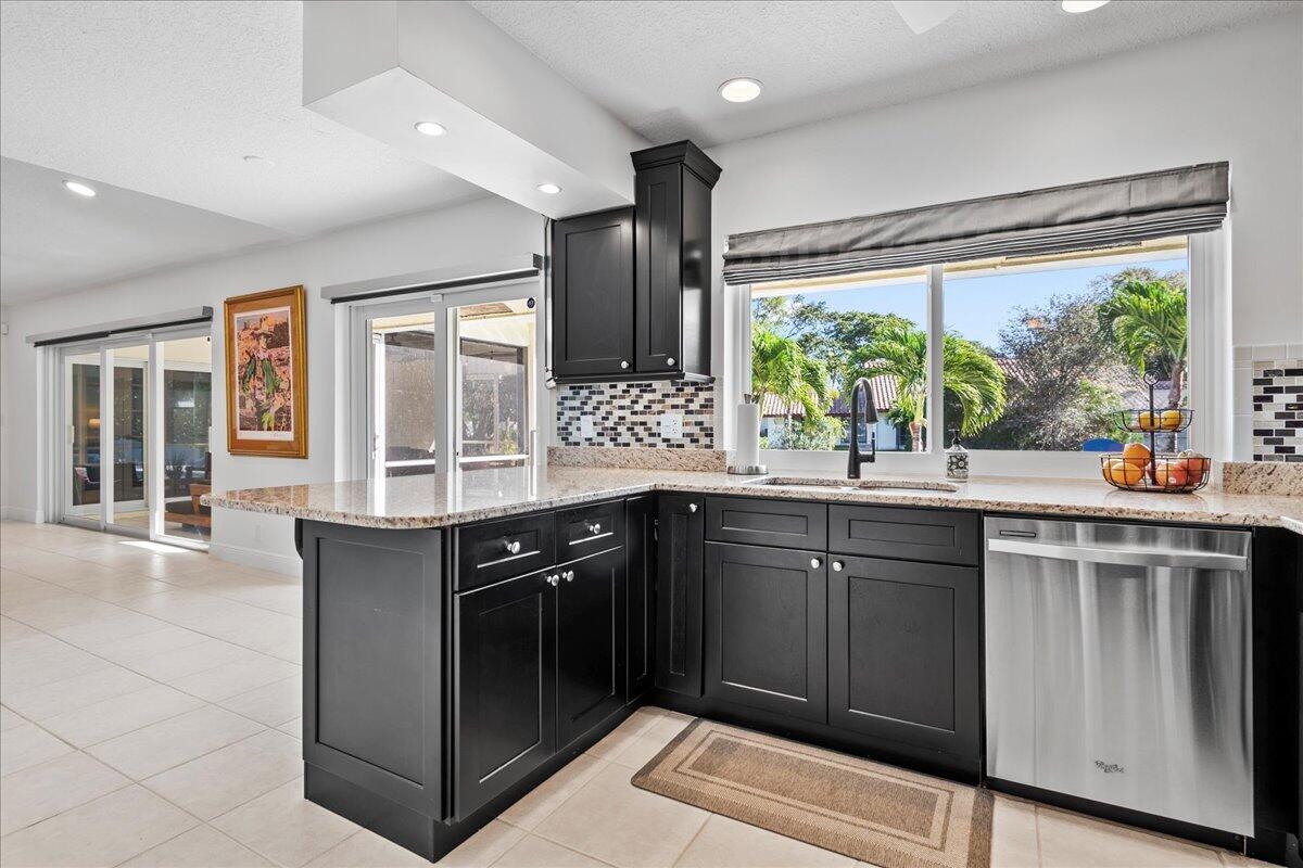 1969 Southwest 36th Avenue Delray Beach, FL 33445 - Photo 9 of 40 Kitchen Bar and Pass thru window