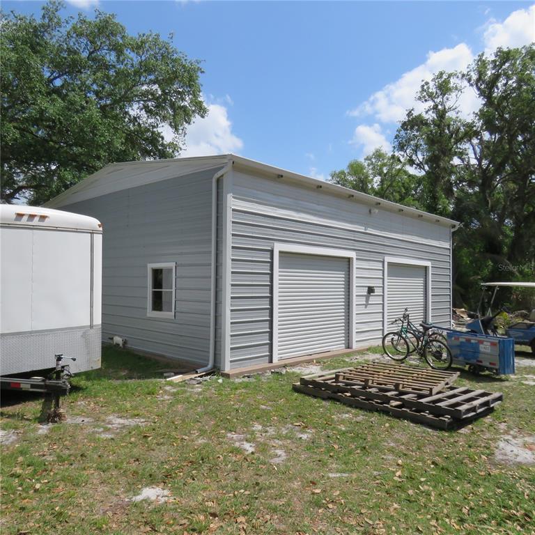 8505 Franklin Road Plant City, FL 33565 - Photo 7 of 25 a view of a house with backyard and sitting area