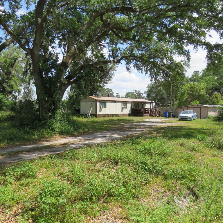 8505 Franklin Road Plant City, FL 33565 - Photo 8 of 25 a view of house with yard