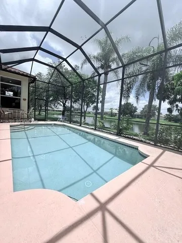 a view of outdoor space with swimming pool