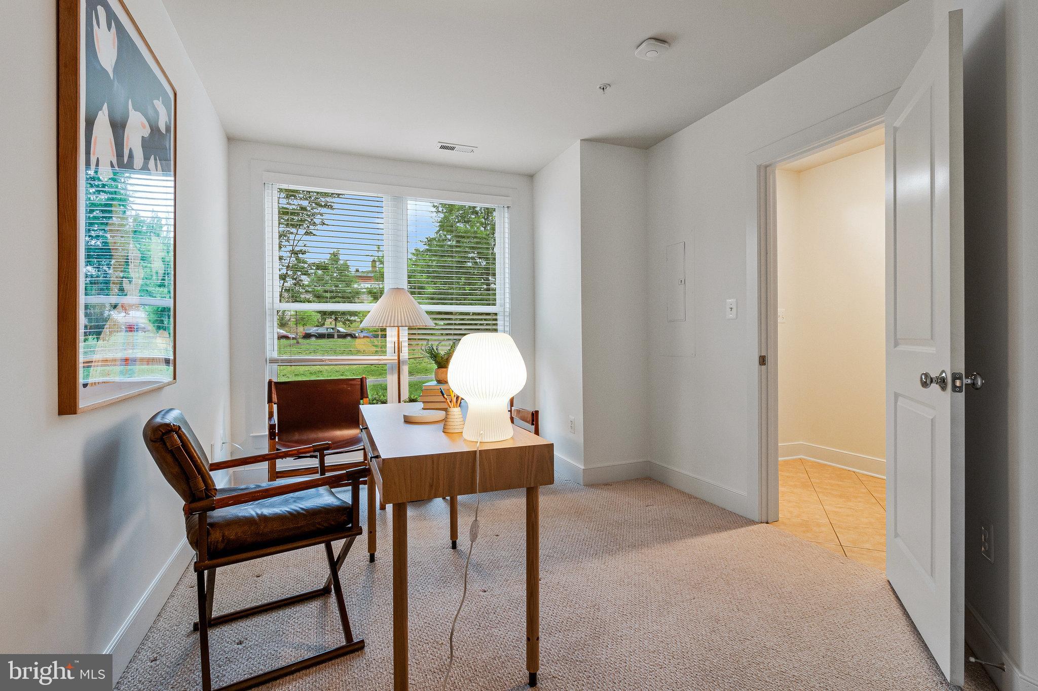 415 I Street Southeast Washington, DC 20003 - Photo 5 of 58 a living room with furniture a table and a window