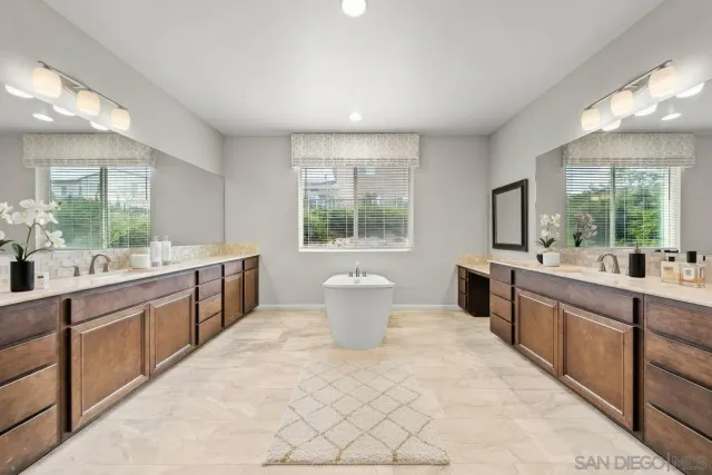 a large kitchen with a large window