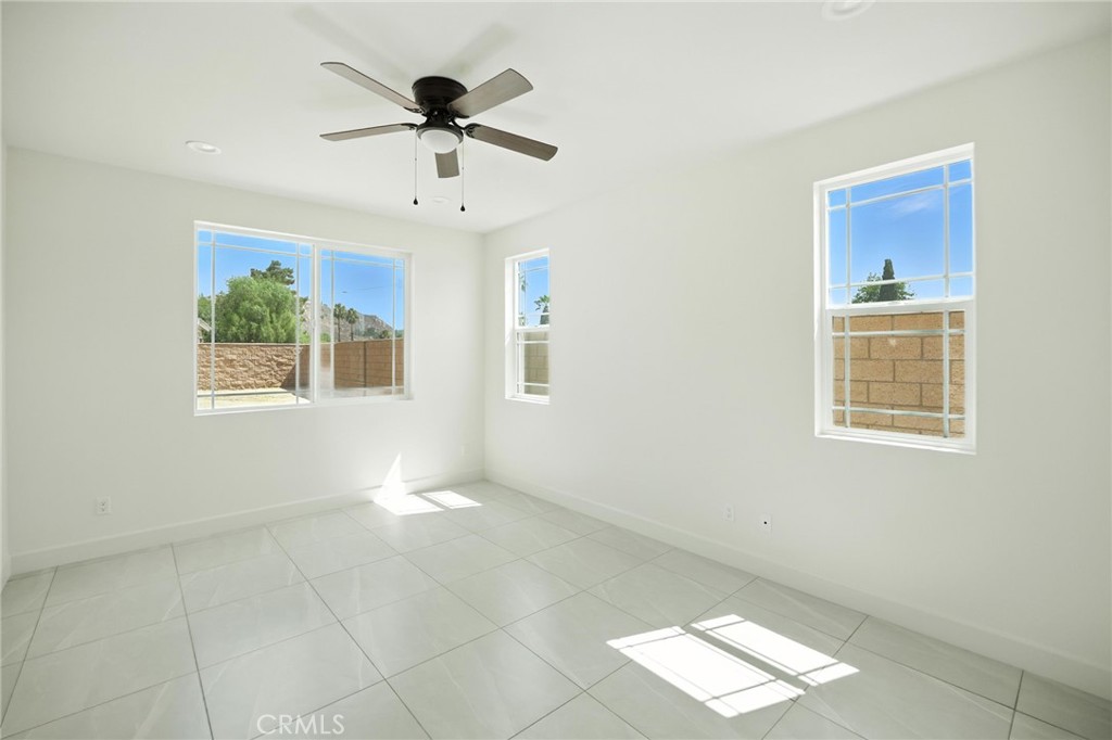 5151 Peony Court Riverside, CA 92506 - Photo 11 of 23 a view of an empty room with a window