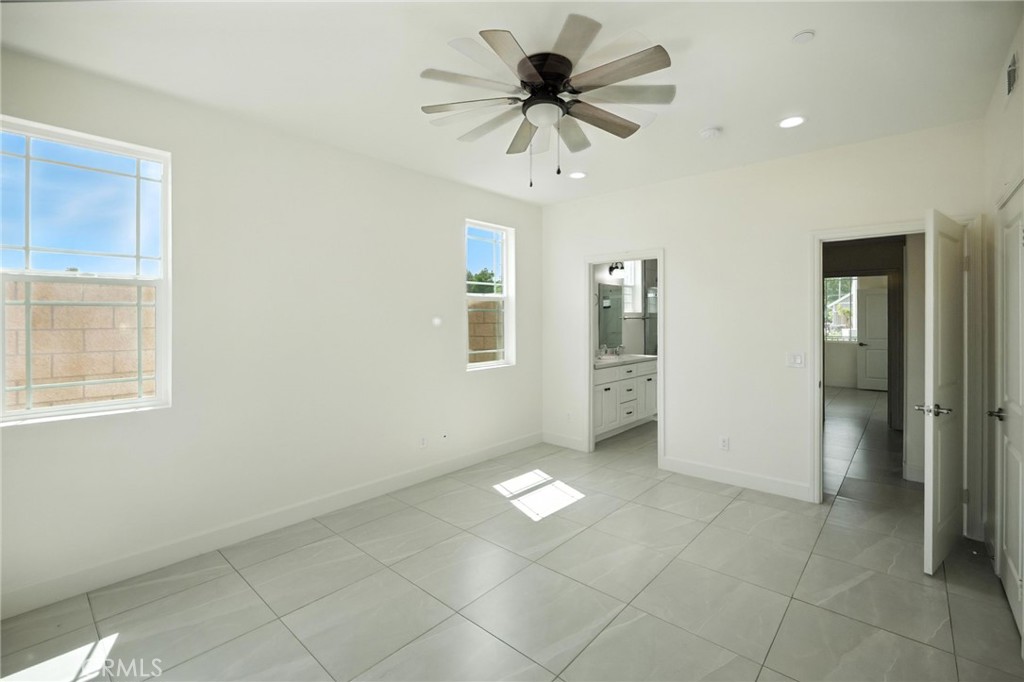 5151 Peony Court Riverside, CA 92506 - Photo 13 of 23 a view of an empty room with a window