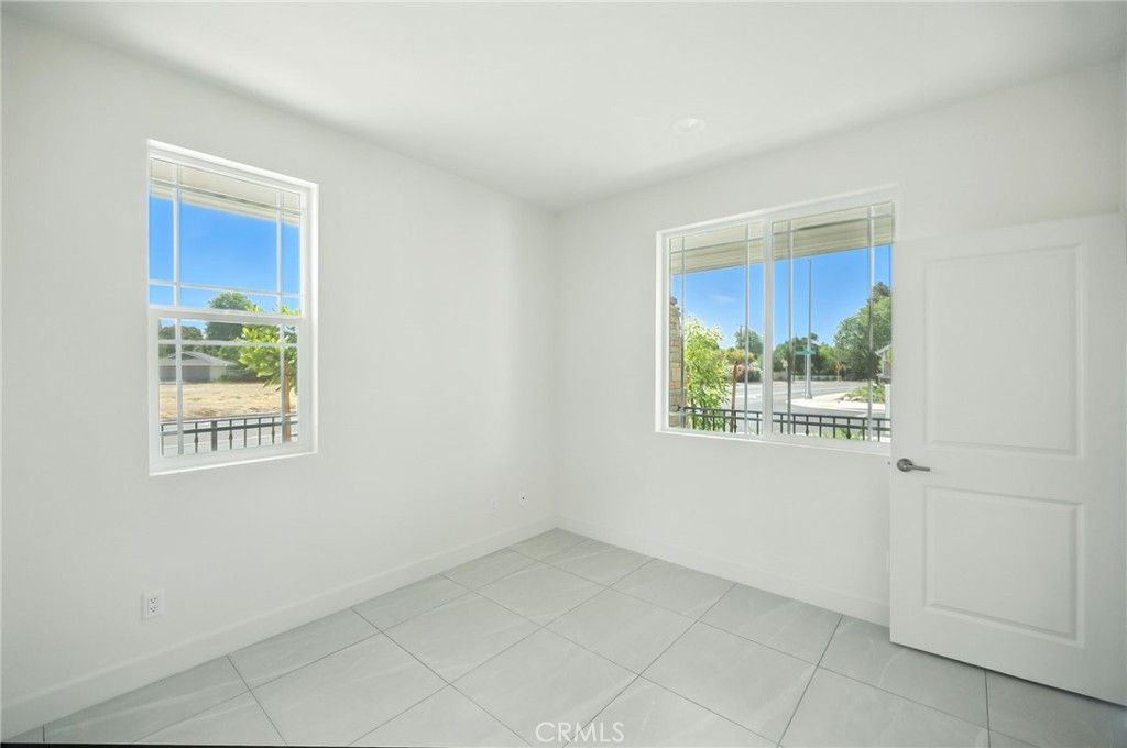 5151 Peony Court Riverside, CA 92506 - Photo 3 of 23 a view of an empty room with a window