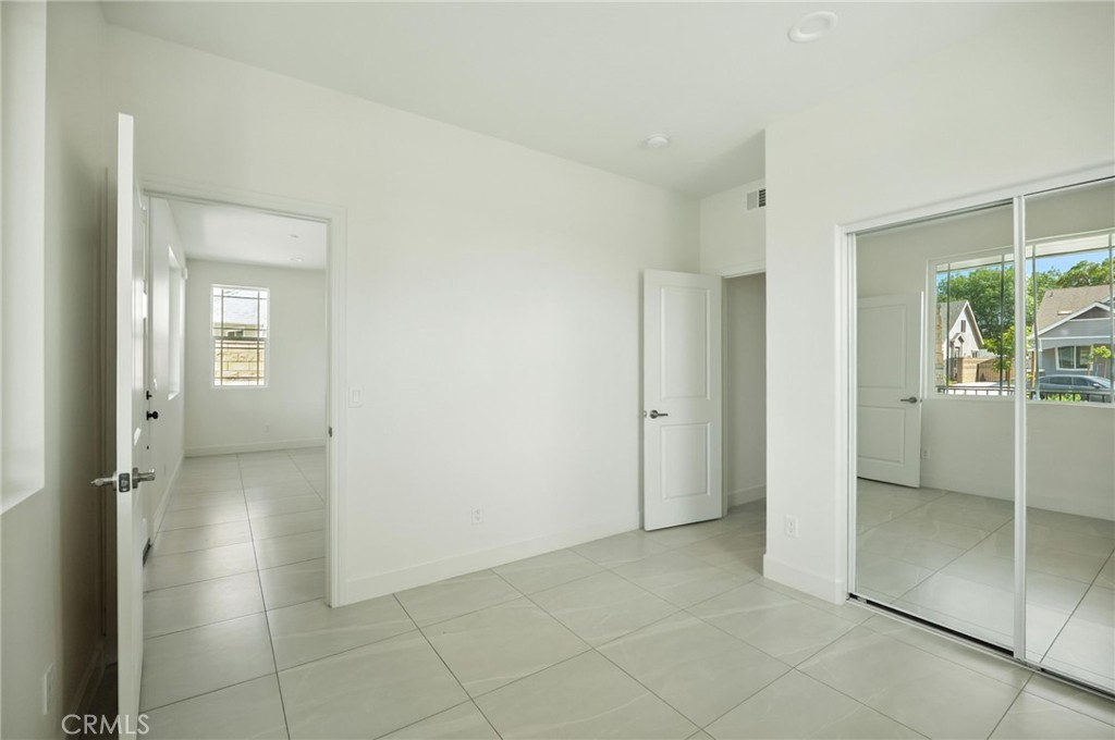 5151 Peony Court Riverside, CA 92506 - Photo 4 of 23 a view of an empty room with a bathroom