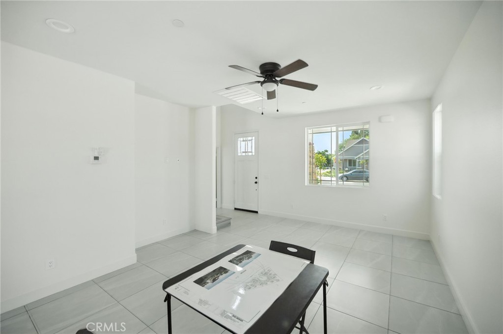 5151 Peony Court Riverside, CA 92506 - Photo 6 of 23 a view of a workspace with furniture and a window
