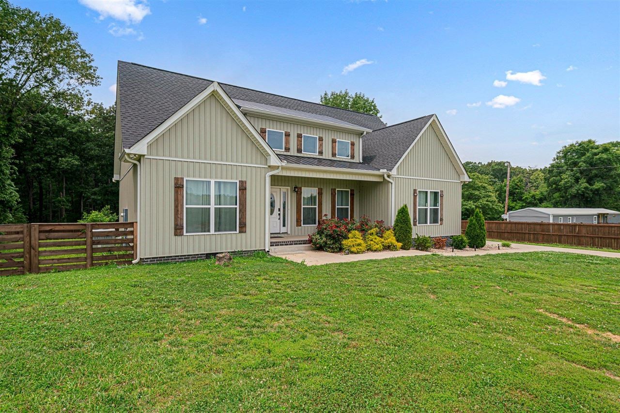 6400 Williams Road Cross Plains, TN 37049 - Photo 1 of 11 a view of a house with a yard and sitting area