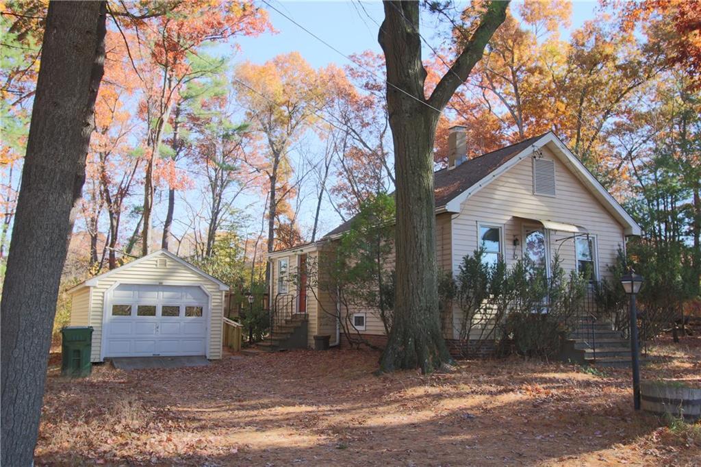 273 Rood Avenue Windsor, CT 06095 - Photo 1 of 1 a white house that has a tree in front of it