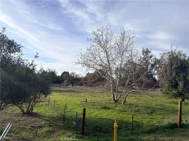 a view of a lake with a yard