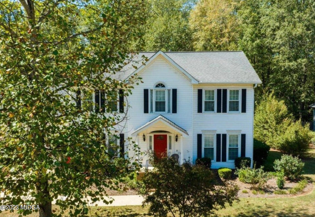 191 Rivoli Landing Macon, GA 31210 - Photo 1 of 45 a front view of a house with a yard and garage