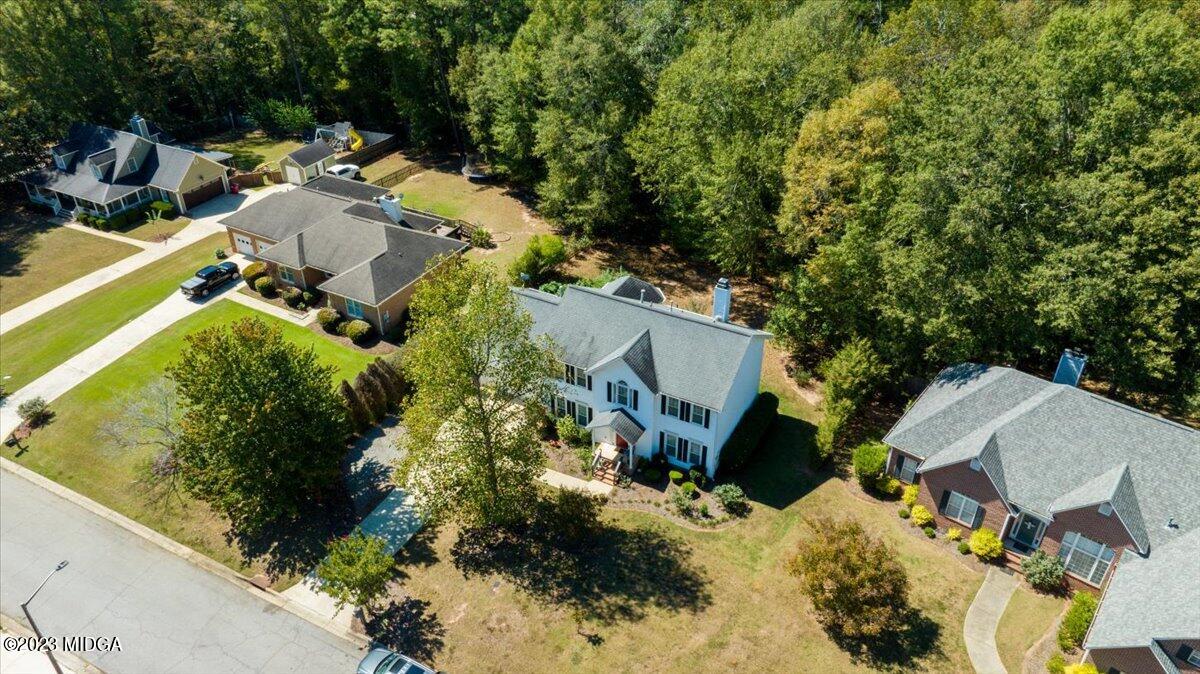 191 Rivoli Landing Macon, GA 31210 - Photo 30 of 45 an aerial view of a house with a yard and lake view