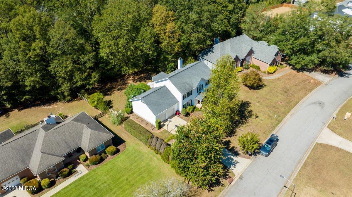 191 Rivoli Landing Macon, GA 31210 - Photo 32 of 45 an aerial view of a house with swimming pool and large trees