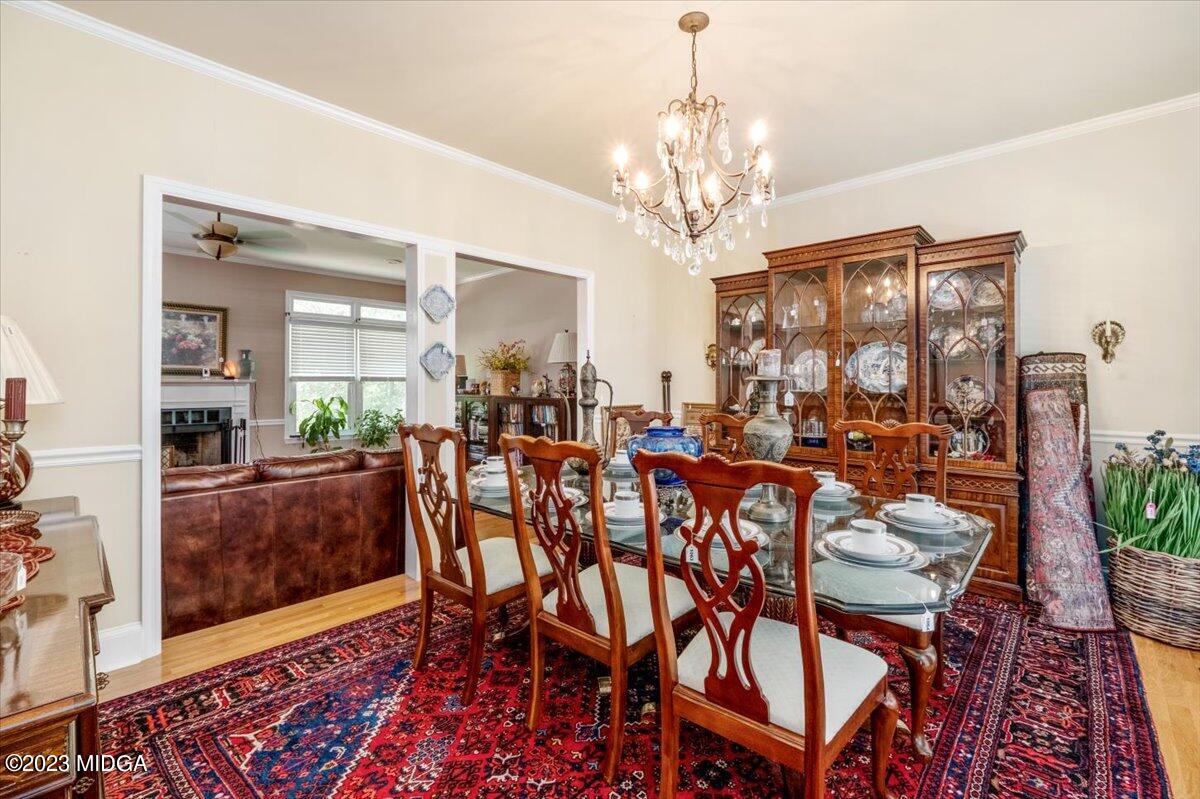 191 Rivoli Landing Macon, GA 31210 - Photo 4 of 45 a view of a dining room with furniture and chandelier