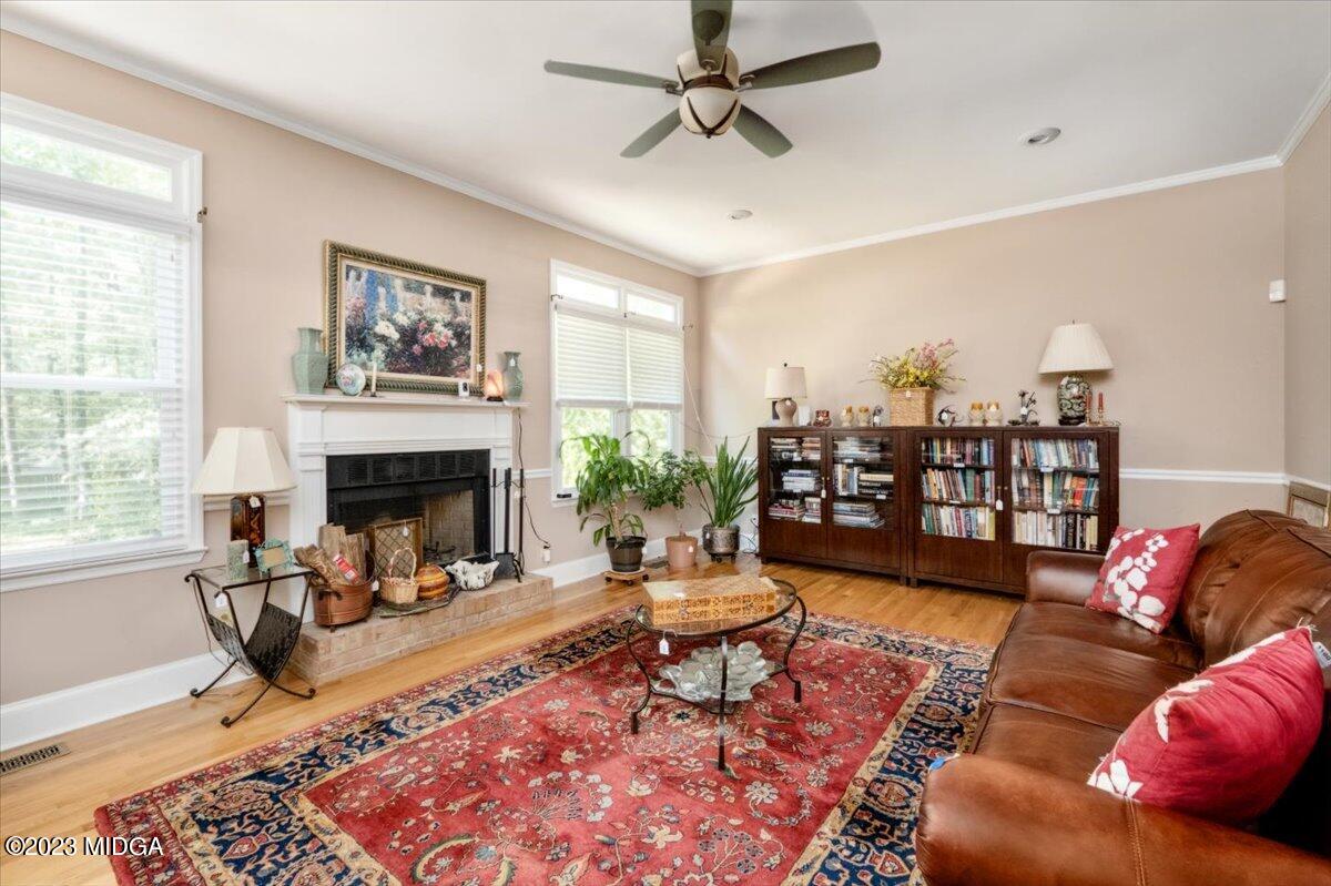 191 Rivoli Landing Macon, GA 31210 - Photo 6 of 45 a living room with furniture and a fireplace