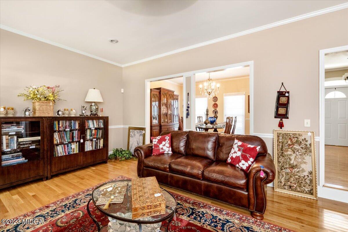 191 Rivoli Landing Macon, GA 31210 - Photo 7 of 45 a living room with furniture and a wooden floor