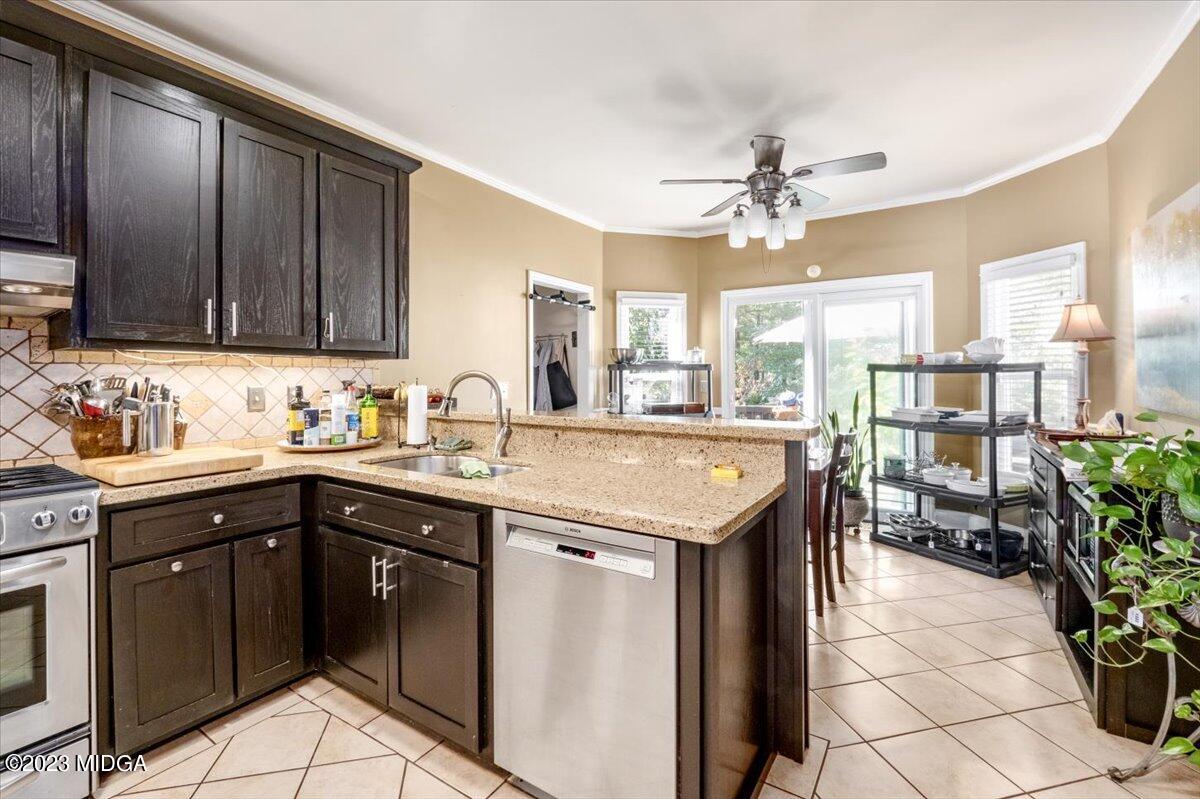 191 Rivoli Landing Macon, GA 31210 - Photo 10 of 45 a kitchen with a sink a center island and appliances