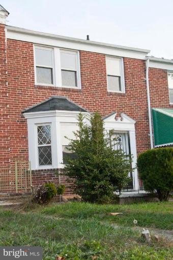 1538 Northgate Road Baltimore, MD 21218 - Photo 28 of 30 front view of a house with a yard