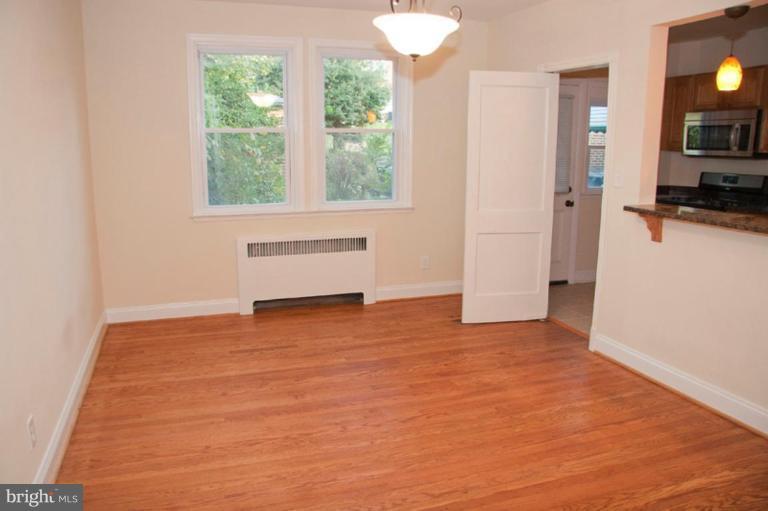 1538 Northgate Road Baltimore, MD 21218 - Photo 6 of 30 a view of empty room with floor to ceiling window